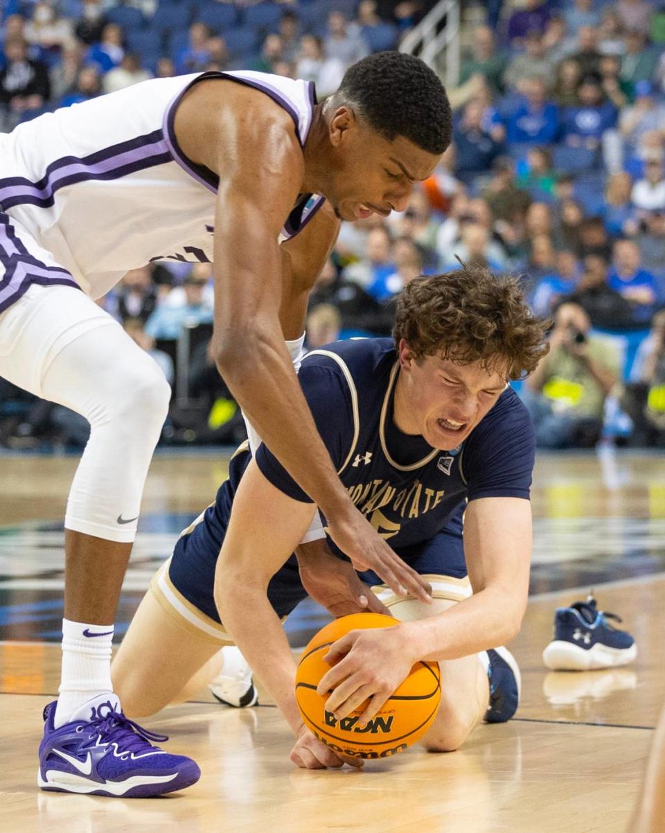 Kansas State’s David N’Guessan scrambles after a loose ball against Montana State’s Sam Lecholat during the first half of their first round NCAA Tournament game in Greensboro, NC on Friday night.