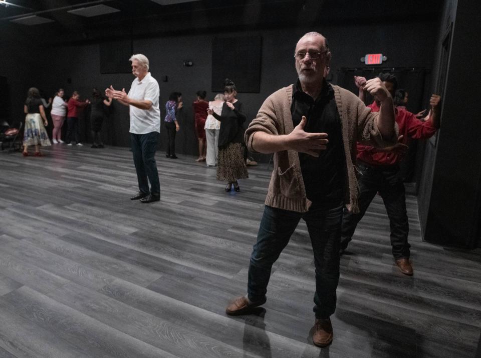 PensaTango instructor Robert Mobilia, right, demonstrates basic tango technique during a class at the Gordon Community Art Center on North DeVilliers Street in downtown Pensacola on Monday, Feb. 13, 2023.