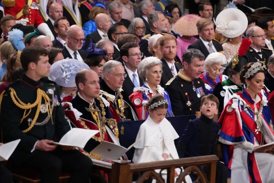 london, england may 06 front, left to right princ william, the prince of wales, princess charlotte, prince louis and catherine, princess of wales with the duke of sussex sat in the third row, at the coronation ceremony of king charles iii and queen camilla in westminster abbey, on may 6, 2023 in london, england photo victoria jones wpa poolgetty images