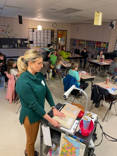 KOIN 6 anchor Emily Burris celebrates National Read Across America Day with students at John Wetten Elementary School in Gladstone on Mar. 1, 2024 (KOIN)