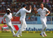 Cricket - India v England - Second Test cricket match - Dr. Y.S. Rajasekhara Reddy ACA-VDCA Cricket Stadium, Visakhapatnam, India - 17/11/16. England's Stuart Broad (R) celebrates with team mates after taking the wicket of India's Lokesh Rahul. REUTERS/Danish Siddiqui