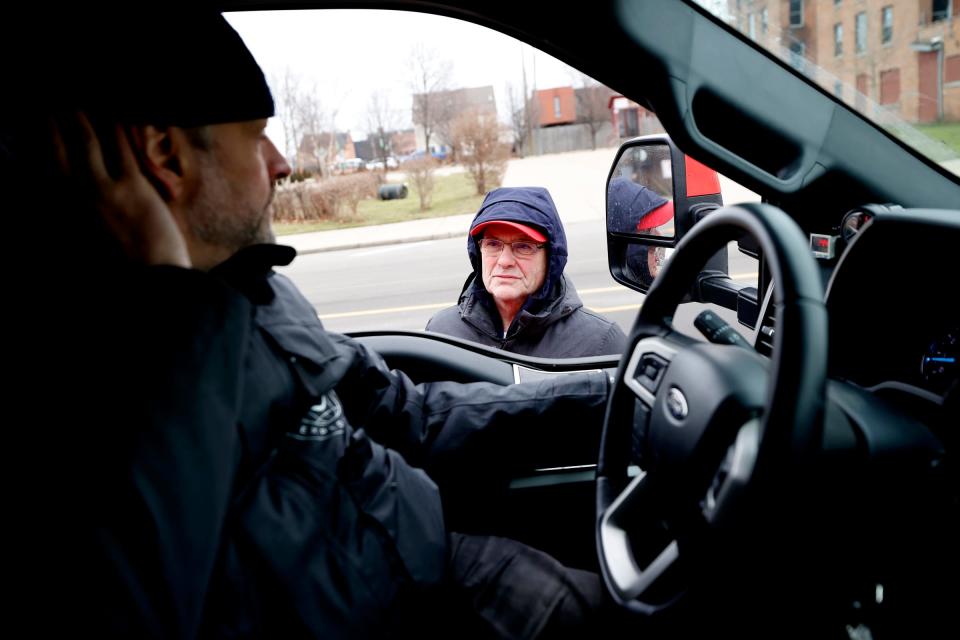 Andrew Comrie-Picard, 52 of Los Angeles and Emil Grimsson, founder of Arctic Trucks talk while stopped in Detroit on Friday, January 12, 2024. The Transglobal Car Expedition that they are a part of is planning on driving from the North to the South Pole over the next 17 months. The caravan of modified Ford trucks was recently in New York State and came through Detroit and made a stop at Ford Motor Company World Headquarters in Dearborn.