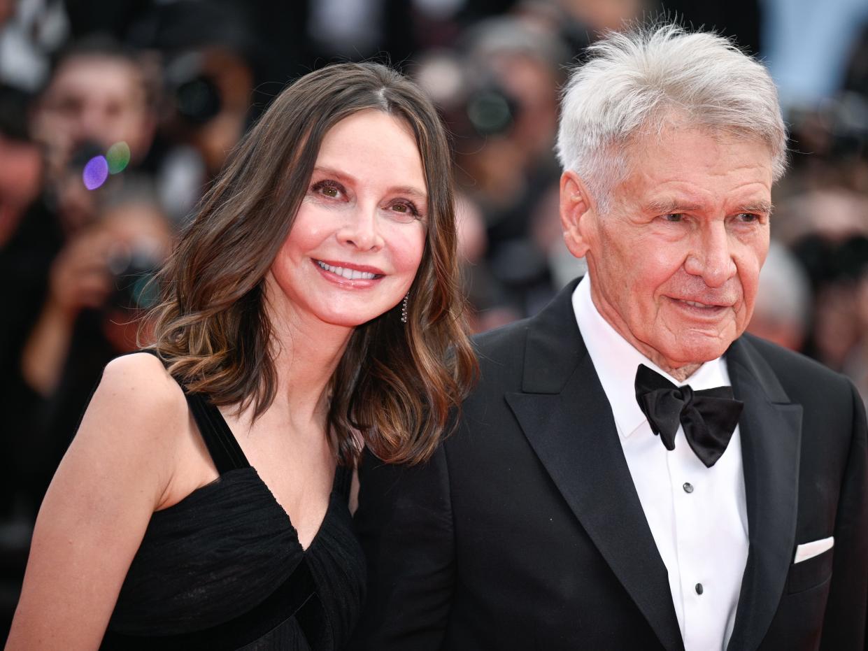 Calista Flockhart and Harrison Ford are photographed while walking together on the red carpet at the premier "Indiana Jones And The Dial Of Destiny."