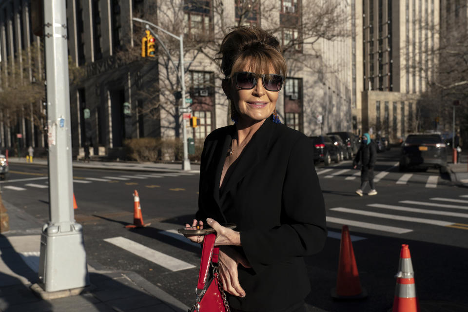 Former Alaska Gov. Sarah Palin arrives to Federal court in New York City on Friday, Feb. 11, 2022. Palin claims the New York Times damaged her reputation with an editorial linking her campaign rhetoric to a mass shooting. (AP Photo/Jeenah Moon)