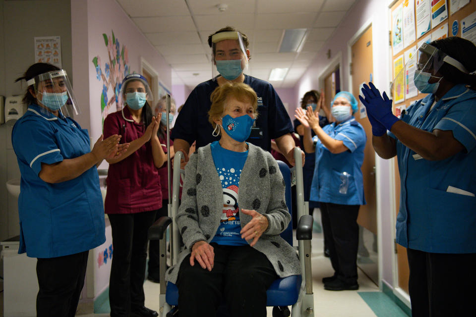 Margaret Keenan, 90, is applauded by staff as she returns to her ward after becoming the first person in the United Kingdom to receive the Pfizer/BioNtech covid-19 vaccine at University Hospital, Coventry, at the start of the largest ever immunisation programme in the UK's history.