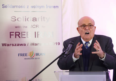 FILE PHOTO: Rudy Giuliani, former Mayor of New York City speaks prior to a rally against Iranian government's human rights violations during a global summit focused on the Middle East and Iran in Warsaw, Poland February 13, 2019. Jedrzej Nowick/Agencja Gazeta/via REUTERS/File Photo