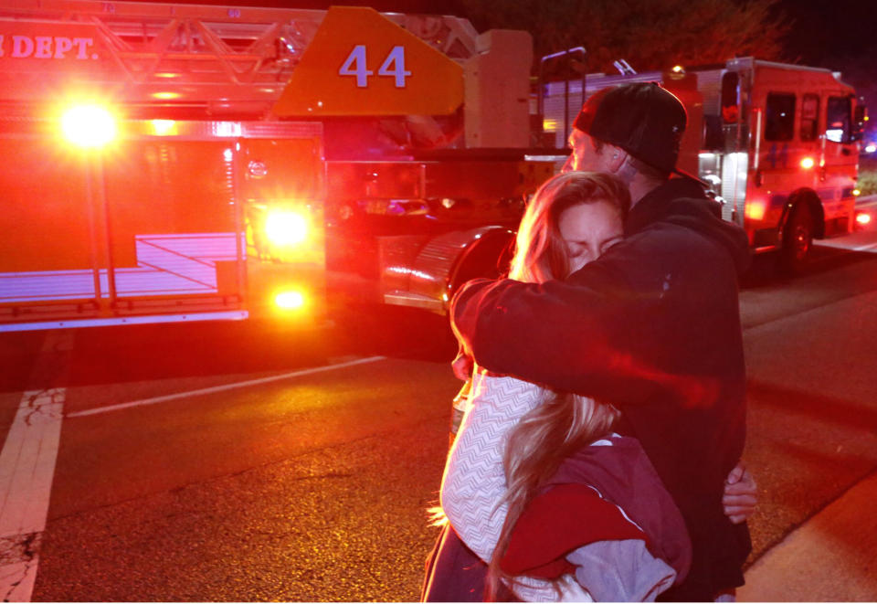 Molly Esterline is hugged by David Crawford near the scene.