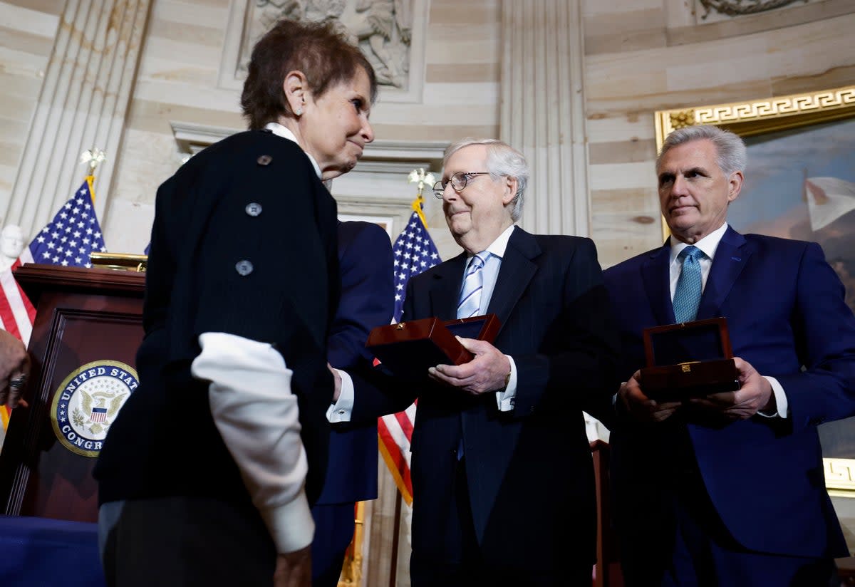 Gladys Sicknick, mother of fallen Capitol Police officer Brian Sicknick, refuses to shake Mitch McConnell’s hand  (Getty Images)