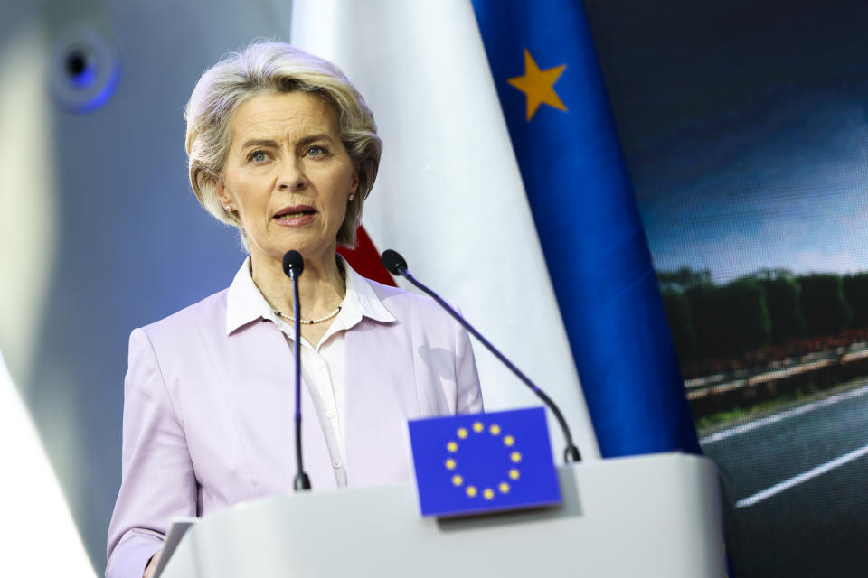 European Commission President Ursula von der Leyen briefs the media during a joint news conference with Polish President Andrzej Duda and Poland's Prime Minister Mateusz Morawiecki at the headquarters of Poland's Power Grid in Konstancin-Jeziorna, Poland, Thursday, June 2, 2022. The independence of Poland's courts is at the heart of a dispute with the European Union, which has withheld billions of euros in pandemic recovery funds. European Commission President Ursula von der Leyen meets Poland's leaders discuss the matter. (AP Photo/Michal Dyjuk)