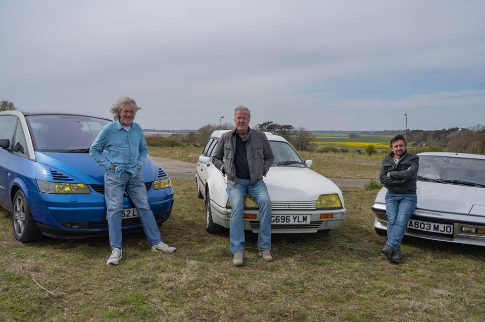 James May, Jeremy Clarkson and Richard Hammond pose next to three French cars in the countryside in The Grand Tour Presents: Carnage A Trois. Photo: Amazon Prime Video (supplied).