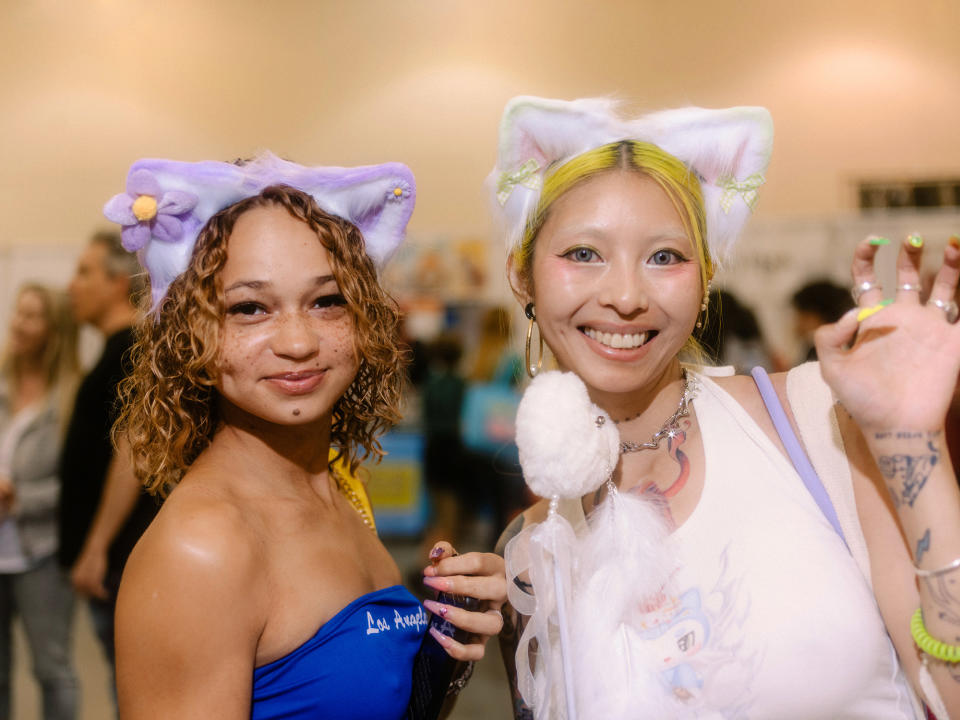 Kristina Martinez, left, and Lisha Sun at CatCon in Pasadena, California, on Oct. 2, 2022