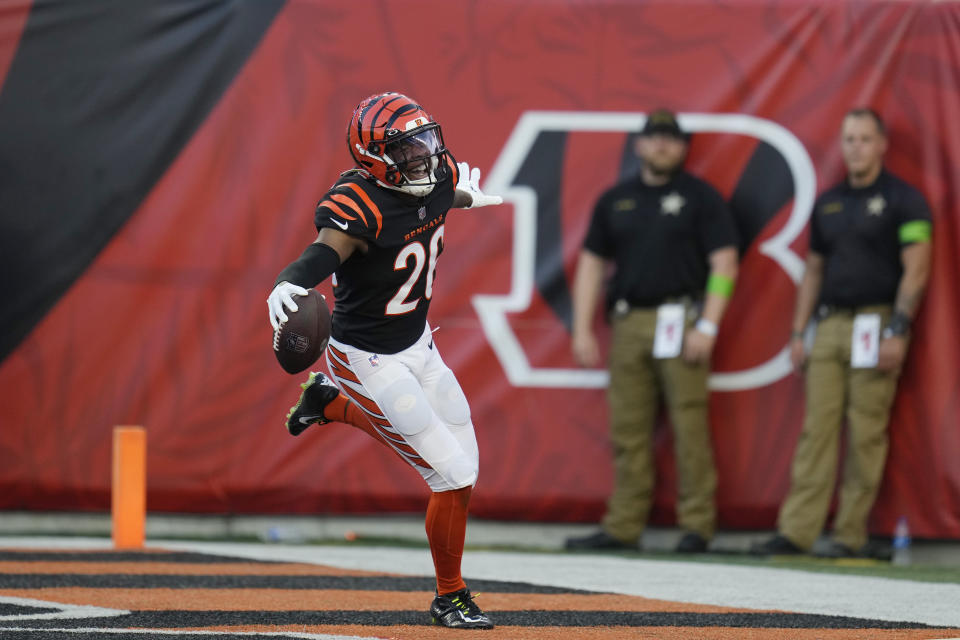 Cincinnati Bengals safety Tycen Anderson returns an intercepted pass for a touchdown during the first half of a preseason NFL football game against the Green Bay Packers on Friday, Aug. 11, 2023, in Cincinnati. (AP Photo/Michael Conroy)