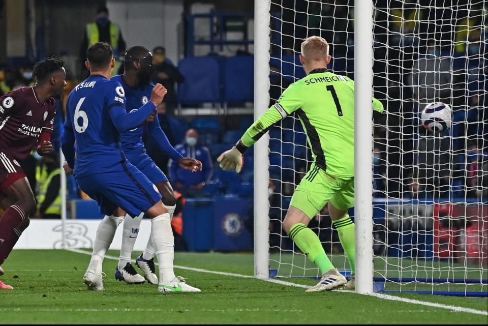 <p>On target: Antonio Rudiger, wearing a face mask, puts Chelsea ahead against Leicester</p> (POOL/AFP via Getty Images)