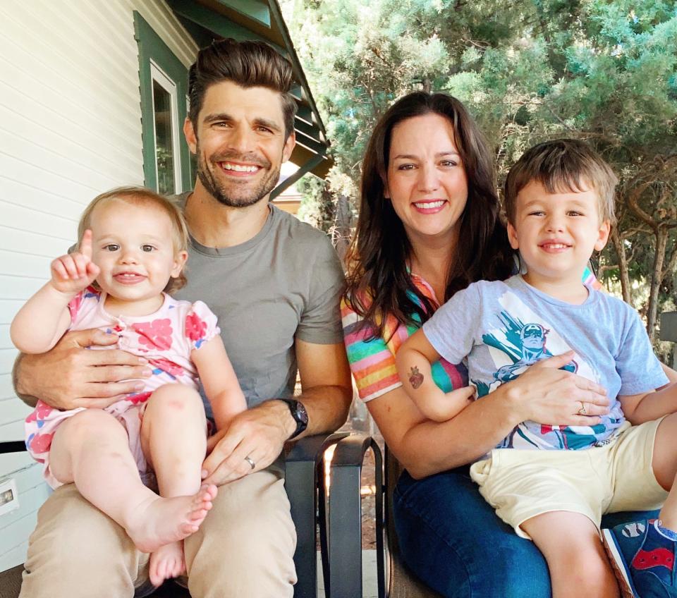 Cole Gerdes, left, with his wife Tristen and children Della, on Cole's lap, and Wyatt. Gerdes recently released his first album, which he titled "Barley Pops Ridin' Shotgun."