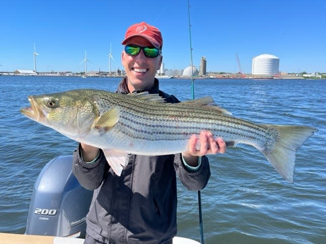 Mark Tracy of Barrington hooked up with this 34” striped bass using a surface plug this week in the Providence River in front of the wind mills.