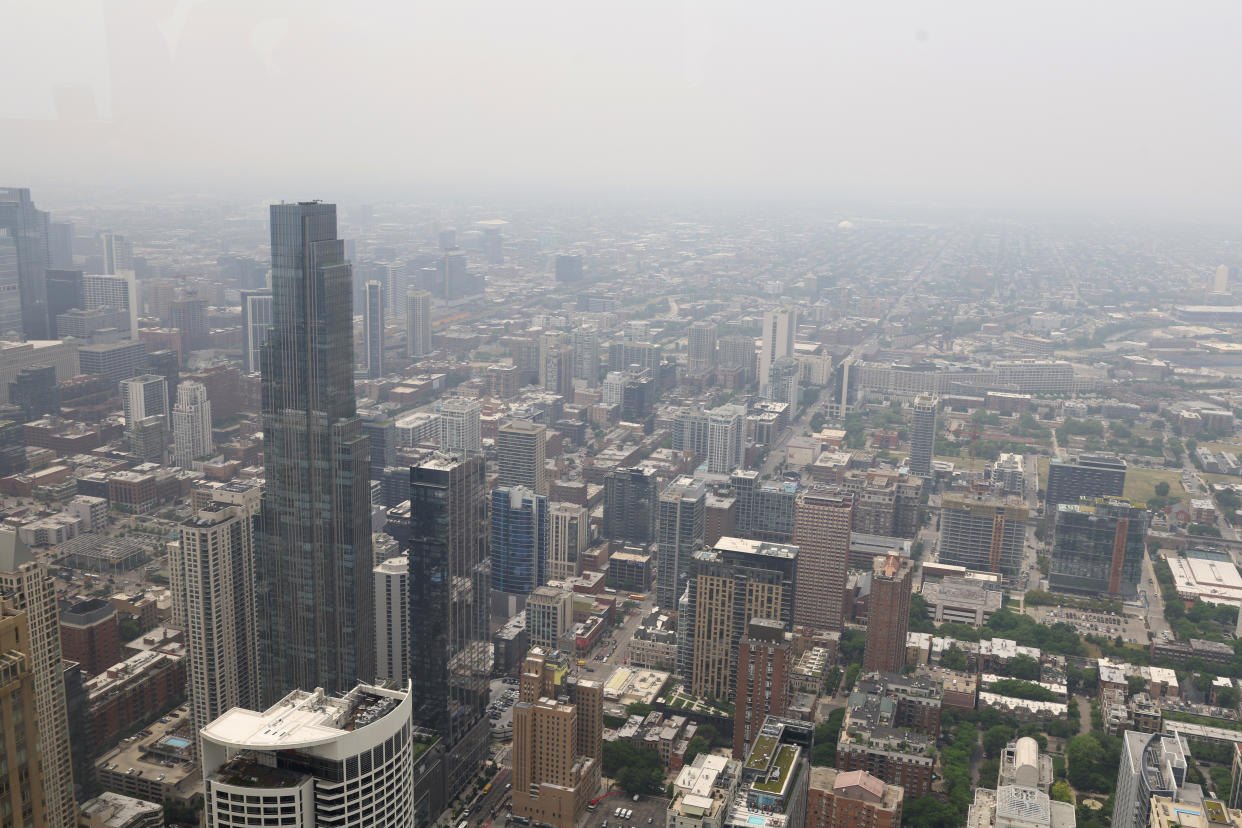 Wildfire smoke obscures the view from a skyscraper in Chicago.