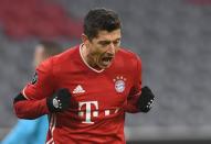 El delantero Robert Lewandowski celebra tras anotar un gol en la victoria 3-1 sobre el FC Salzburgo en el partido por el Grupo A de la Liga de Campeones, en el Allianz Arena, Múnich, Alemania