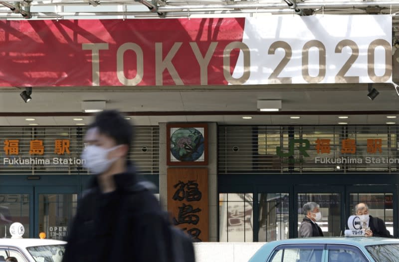 The banner for the 2020 Tokyo Olympics is displayed in front of Fukushima station in Fukushima, Japan