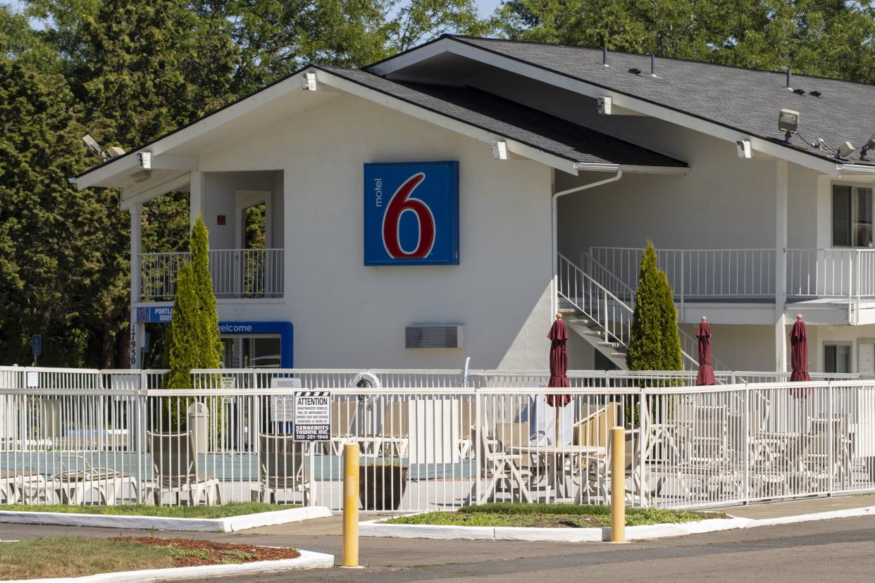 Tigard, OR, USA - July 4, 2021: Exterior view of the Motel 6 in Tigard, Oregon. The budget hotel brand is owned by The Blackstone Group.