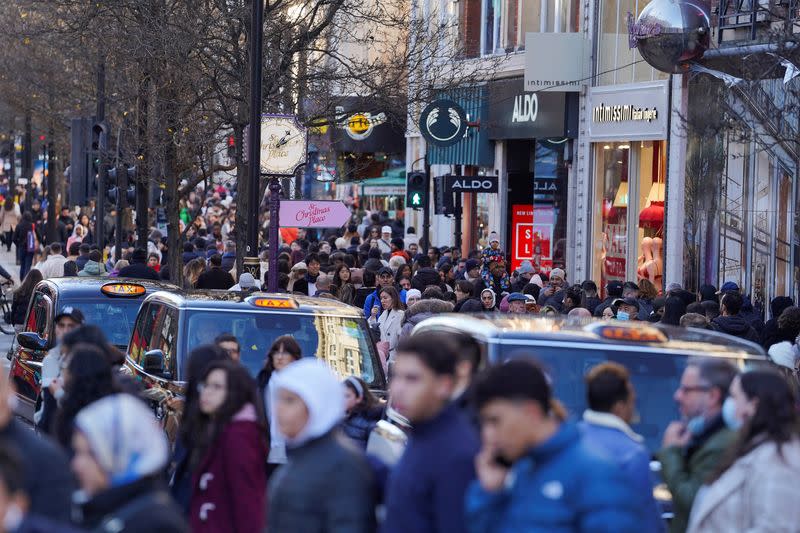 FILE PHOTO: Shoppers hit the Boxing Day sales in London