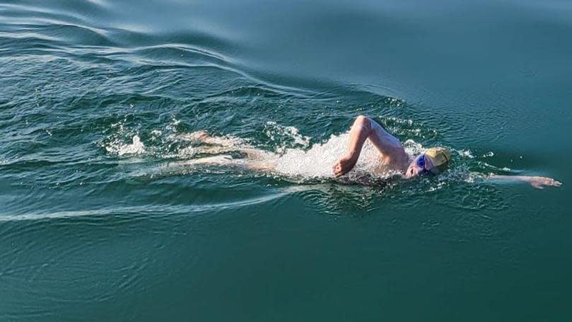 Swimmer Sam Farrow in Lake Geneva 