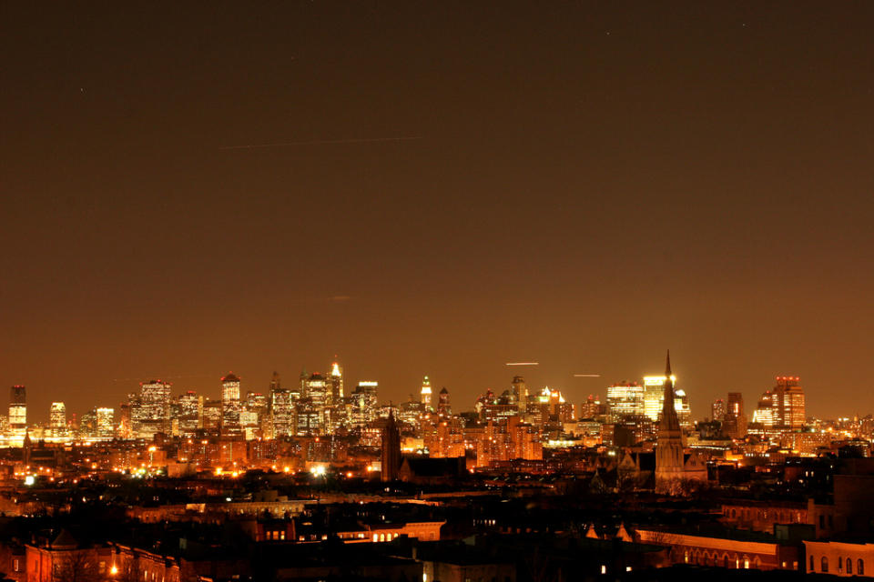 This undated image released by PBS shows the Manhattan skyline lit up at night from the documentary "The City Dark," airing July 5 at 10 p.m. on PBS stations. (AP Photo/PBS)