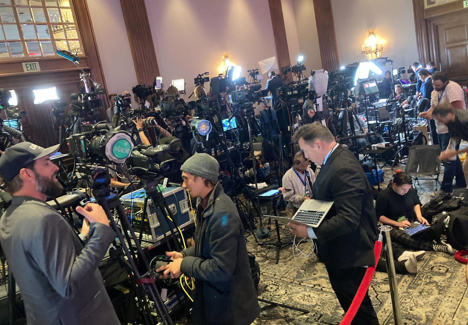 Dozens of camera crews await returns before the polls close at the Republican election night watch party for gubernatorial candidate Kari Lake and U.S. Senate candidate Blake Masters in Scottsdale, Ariz. (AP Photo/Eugene Garcia)