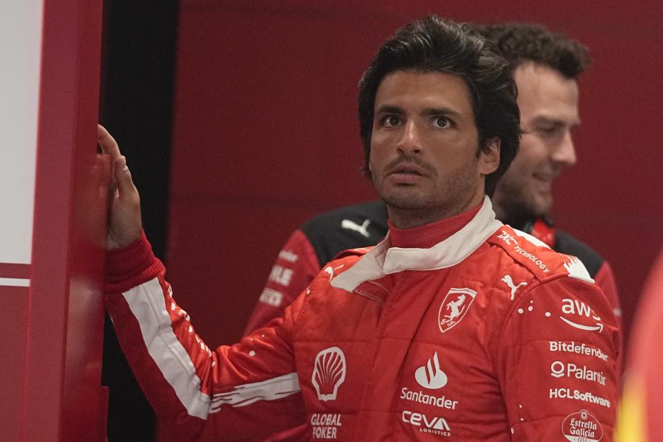 Ferrari driver Carlos Sainz, of Spain, waits in his garage before the start of the second practice session for the Formula One Las Vegas Grand Prix auto race, Friday, Nov. 17, 2023, in Las Vegas. (AP Photo/Darron Cummings)