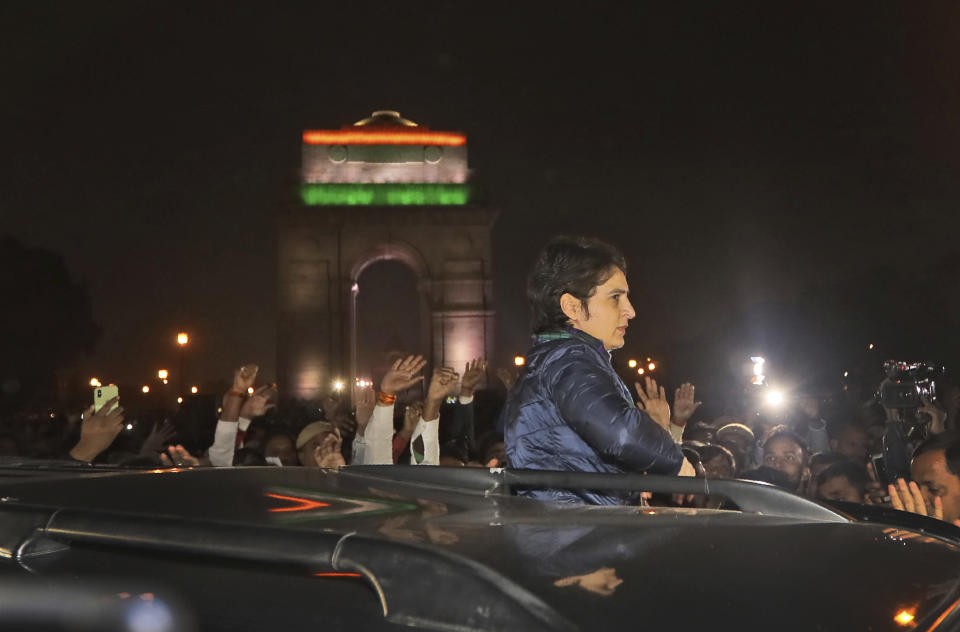 Congress party leader Priyanka Gandhi, center, leaves after a sit in protest against a new citizenship law near the India Gate monument in New Delhi, India, Monday, Dec.16, 2019. The new law gives citizenship to non-Muslims who entered India illegally to flee religious persecution in several neighboring countries. (AP Photo/Manish Swarup)
