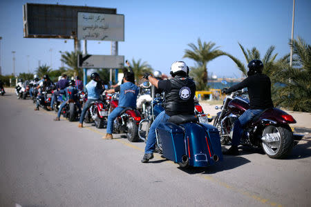 Members of the Tripoli bikers group ride their motorbikes on the streets of Tripoli, Libya November 4, 2017. REUTERS/Ahmed Jadallah