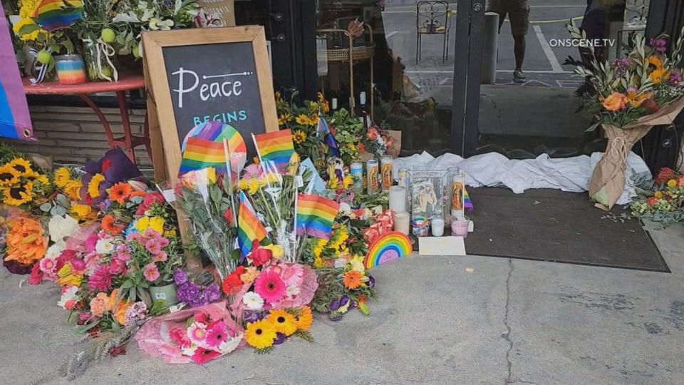PHOTO: Flowers left at a store in Lake Arrowhead, Calif., where a store owner was shot and killed following a confrontation over a Pride flag on Aug. 18, 2023. (OnScene.TV)