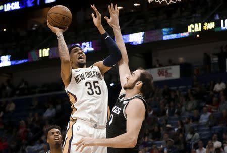 Mar 28, 2019; New Orleans, LA, USA; New Orleans Pelicans forward Christian Wood (35) shoots over Sacramento Kings center Kosta Koufos (41) during the second half at the Smoothie King Center. Mandatory Credit: Derick E. Hingle-USA TODAY Sports