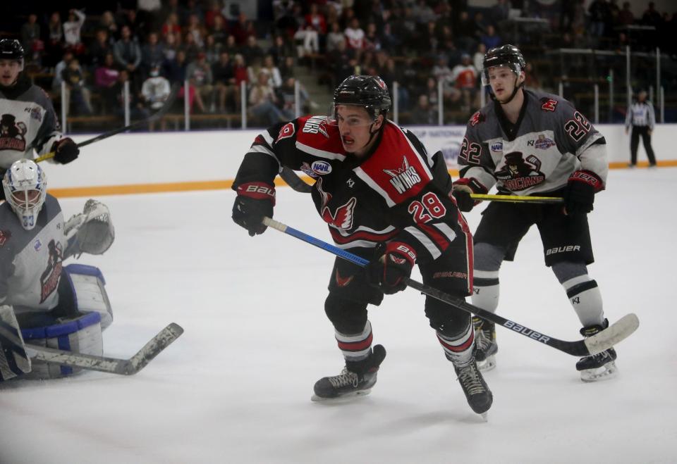 Aberdeen Wings forward Jackson Yee rushes over to the puck in the second period against the Minnesota Magicians in last year's Robertson Cup Finals. American News file photo by Jenna Ortiz.