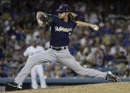 Milwaukee Brewers relief pitcher Josh Hader throws during the eighth inning of Game 3 of the National League Championship Series baseball game against the Los Angeles Dodgers Monday, Oct. 15, 2018, in Los Angeles. (AP Photo/Matt Slocum)