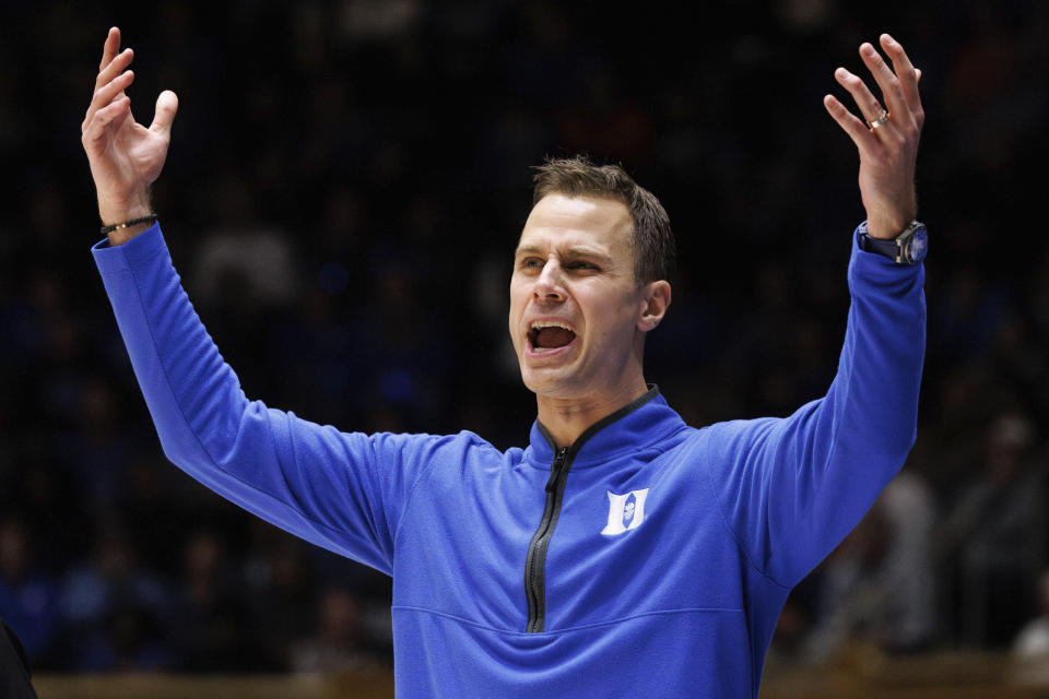 Duke head coach Jon Scheyer reacts to a call during the first half of an NCAA college basketball game against Syracuse in Durham, N.C., Tuesday, Jan. 2, 2024. (AP Photo/Ben McKeown)