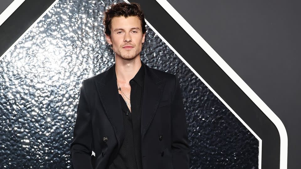 Shawn Mendes arrived ahead of his performance in a wool Dolce & Gabbana tuxedo with flared pants and a silk shirt. - Jamie McCarthy/WireImage/Getty Images