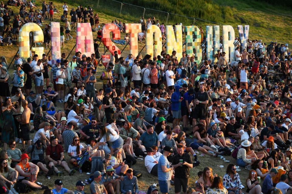 Hundreds of thousands of festival goers flock to Worthy Farm each year (AFP via Getty Images)