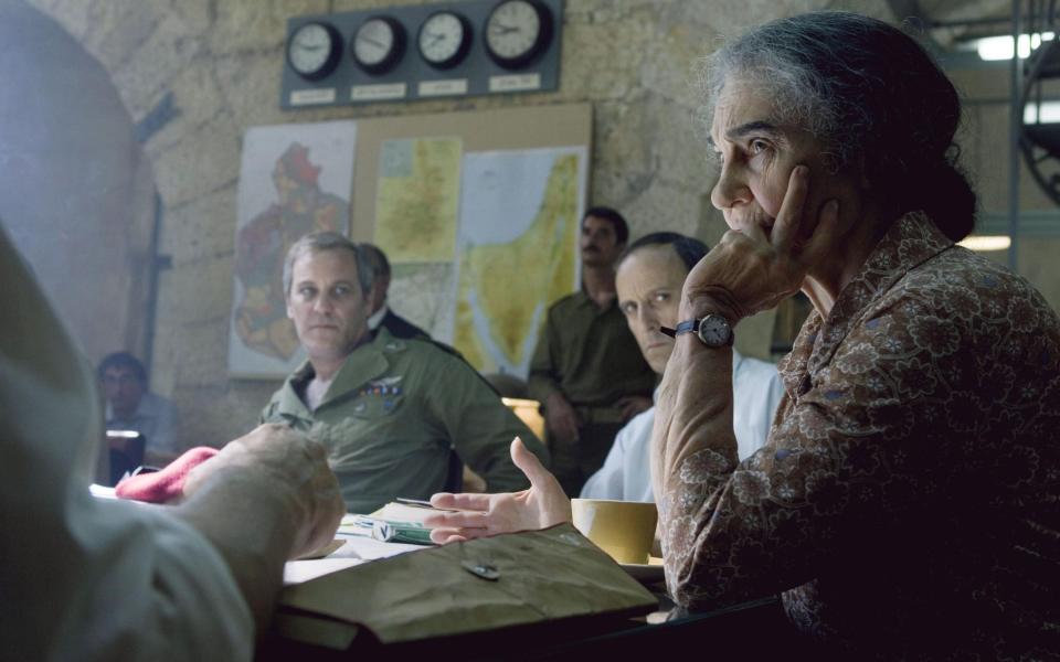 A scene from Steven Spielberg's 2005 film Munich with, l-r, the intelligence officer Michael Harari (Moshe Ivgy), Zamir (Ami Weinberg) and Golda Meir (Lynn Cohen): Weinberg described the film as ‘a fairy tale... based on the director’s fertile imagination’