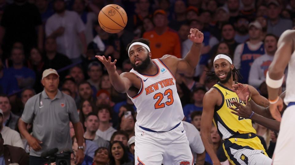  New York Knicks center Mitchell Robinson (23) grabs a rebound against Indiana Pacers forward Isaiah Jackson (22) during the fourth quarter of game one of the second round of the 2024 NBA playoffs at Madison Square Garden.