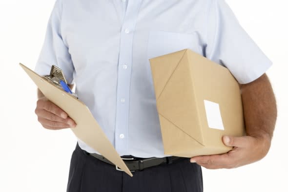 Courier Holding A Parcel And Clipboard