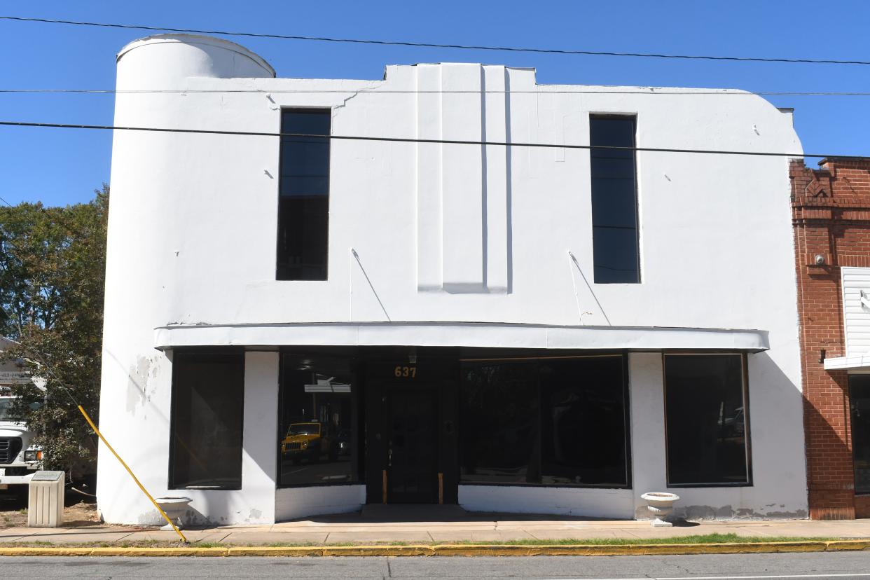 Jorge Rocha, owner of Ad Central, and his wife Hayley Jeffus Rocha have discovered that the art deco-style building located at 637 Main Street has a lot of value culturally and historically. It was built in the 1950s as a roofless movie theatre. They also discovered a hidden basement that had been sealed off with no way to access it. They also found several bottles of bourbon in the basement along with some crafts and ornaments.