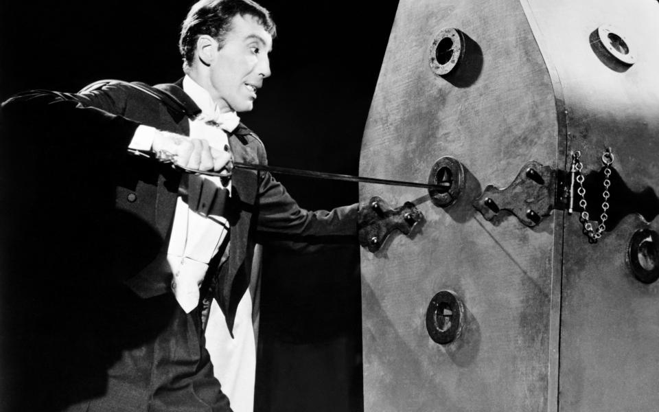 Christopher Lee's film The Hands of Orlac may have inspired Dr No's steel hands - Alamy