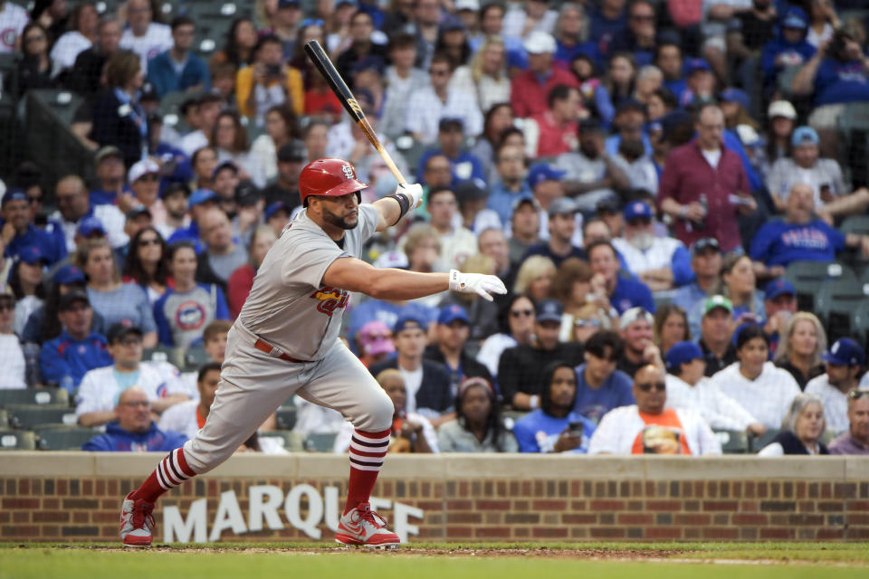 St. Louis Cardinals designated hitter Albert Pujols (5) bats against the Chicago Cubs during the fifth inning of a baseball game, Sunday, June 5, 2022, at Wrigley Field in Chicago. (AP Photo/Mark Black)