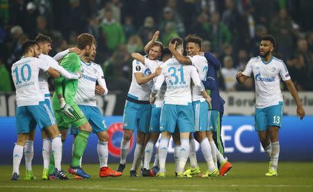 Borussia Moenchengladbach v Schalke 04 - UEFA Europa League Round of 16 Second Leg - Stadion im Borussia Park, Moenchengladbach, Germany - 16/3/17 Schalke 04's players react. REUTERS/Wolfgang Rattay