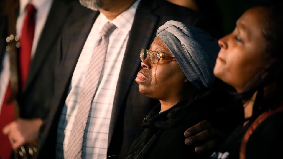 Sheneen McClain is seen in tears as Omar Montgomery consoles her after a verdict was rendered on December 22, 2023 against two paramedics in the killing of her son Elijah McClain. - David Zalubowski/AP