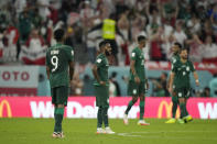 Saudi Arabia players react after Poland's Robert Lewandowski scored his side's second goal during the World Cup group C soccer match between Poland and Saudi Arabia, at the Education City Stadium in Al Rayyan , Qatar, Saturday, Nov. 26, 2022. (AP Photo/Francisco Seco)