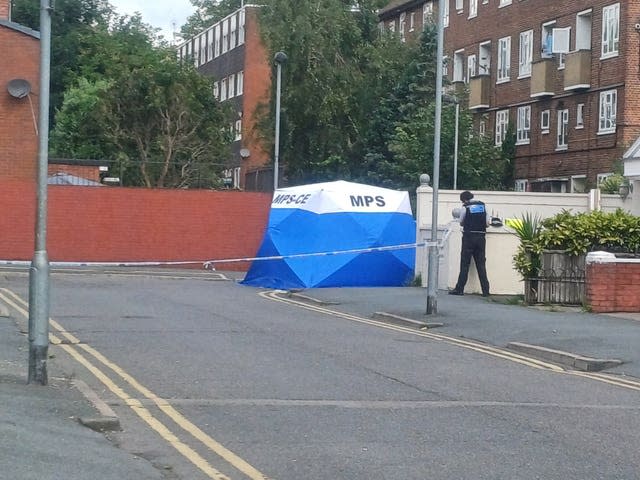 A forensic tent in Stellman Close in Hackney where the 15-year-old boy died after being stabbed