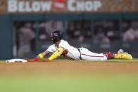 Atlanta Braves Ronald Acuna Jr. slides into second base in the ninth inning of a baseball game against the Philadelphia Phillies, Tuesday, May 24, 2022, in Atlanta. (AP Photo/Todd Kirkland)