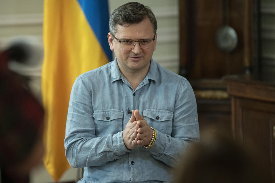 Ukrainian Foreign Minister Dmytro Kuleba speaks during his interview to The Associated Press in Kyiv, Ukraine, Tuesday, July 12, 2022. Ukraine's foreign minister says grain exports from his country's ports won't resume without security guarantees for ship owners, cargo owners and Ukraine as an independent nation. Military officials from Russia and Ukraine were set to hold their governments’ first face-to-face talks in months Wednesday during a session in Istanbul devoted to a United Nations plan to export blocked Ukrainian grain to world markets through the Black Sea. (AP Photo/Andrew Kravchenko)