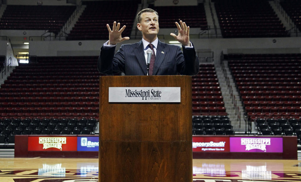 In this photo taken April 2, 2012, Mississippi State athletic director Scott Stricklin speaks during a news conference in Starkville, Miss. Stricklin said he understands why there are raised eyebrows at the amount of money floating around college football. The Bulldogs are right in the middle of the cash grab as part of the behemoth Southeastern Conference _ recently announcing a $75 million expansion of Davis Wade Stadium that will push its capacity to 61,337 seats (AP Photo/Rogelio V. Solis)